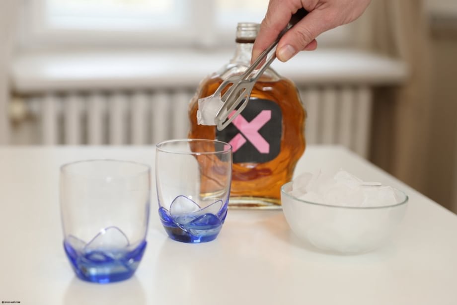 Hot brunette sucks on a hard dick after drinking whiskey on the rocks