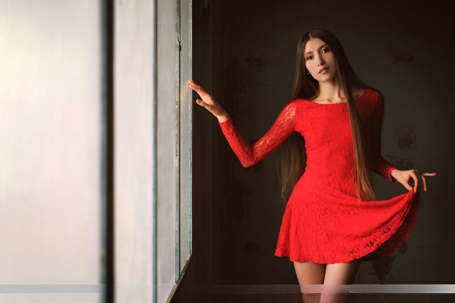 Long legged beauty Saju A removes a red dress for great nude poses