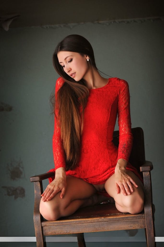 Long legged beauty Saju A removes a red dress for great nude poses