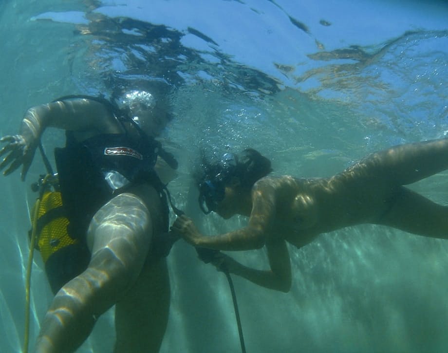 Asian scuba diver gives a BJ underwater before fucking beside pool