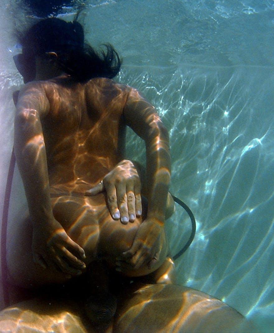Asian scuba diver gives a BJ underwater before fucking beside pool