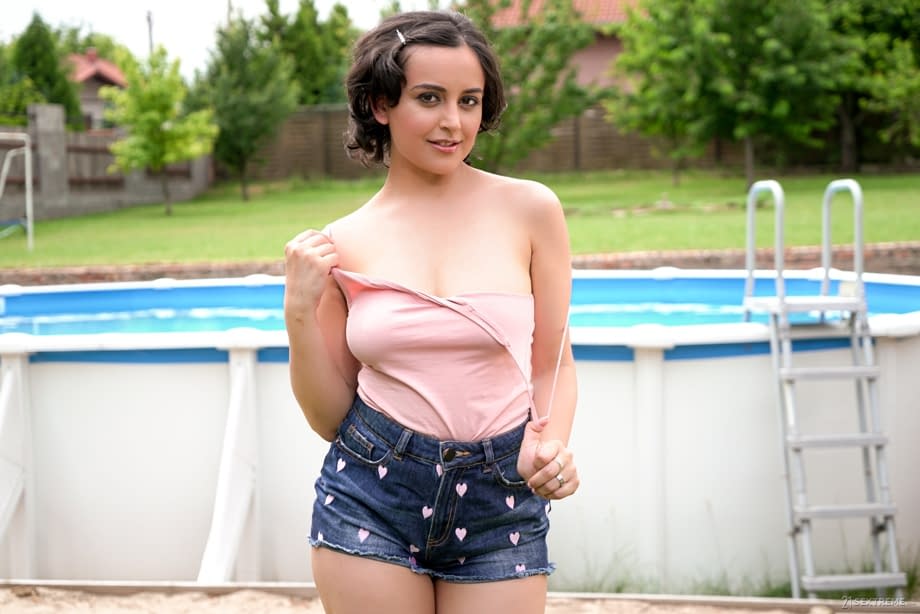 Brunette girl strips by an outdoor pool before PTM action with old neighbour