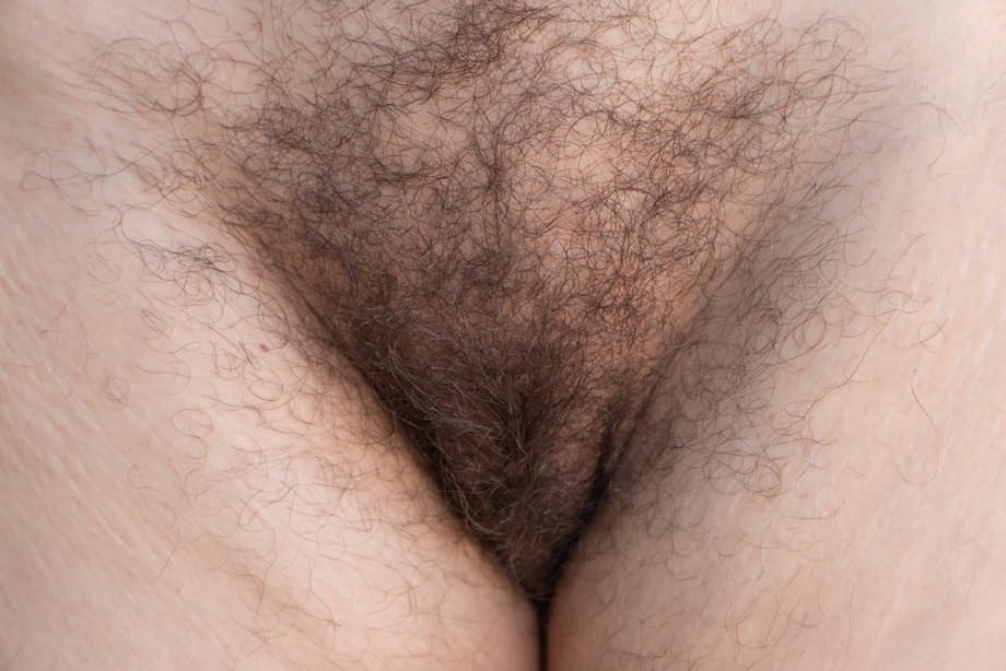 Mature MILF Nimfa Mannay displays her natural pussy beside a dirt road