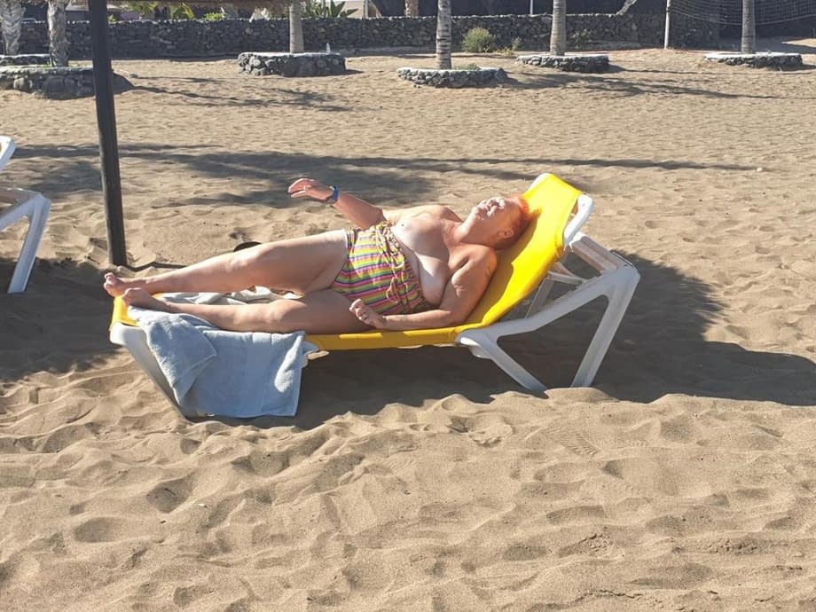 Old SSBBW Val Gasmic dyes her hair red before exposing herself on the beach