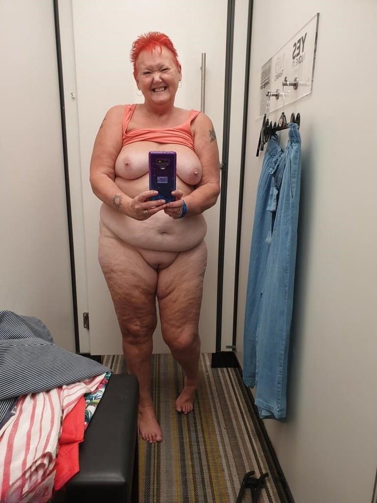 Old SSBBW Val Gasmic dyes her hair red before exposing herself on the beach