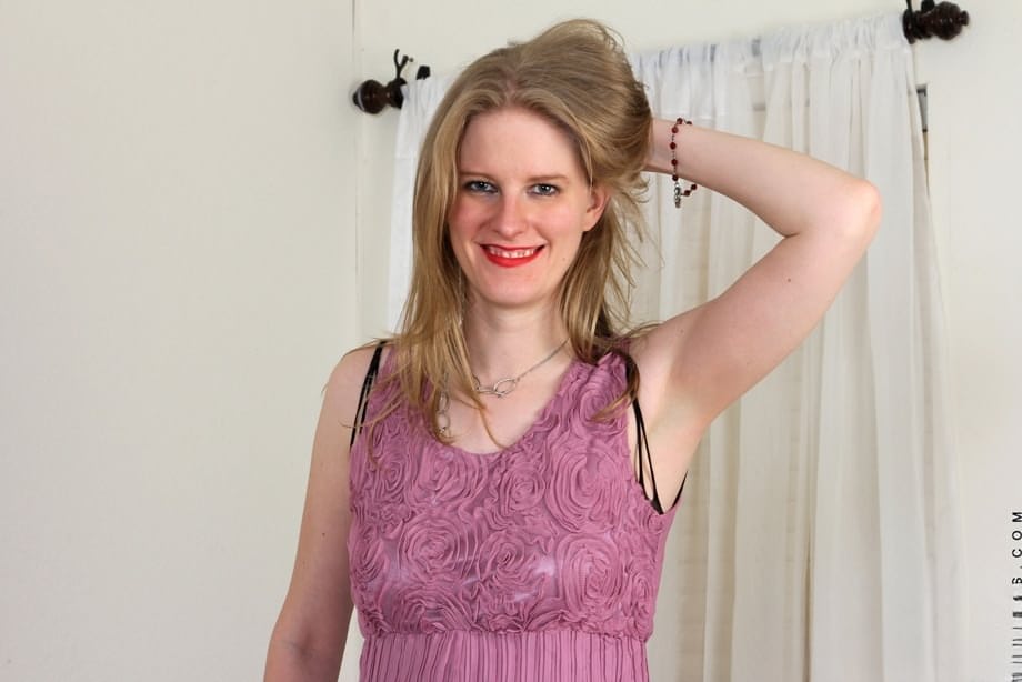 Mature MILF Chelsea Carter removes a crotchless bodystocking before dildoing