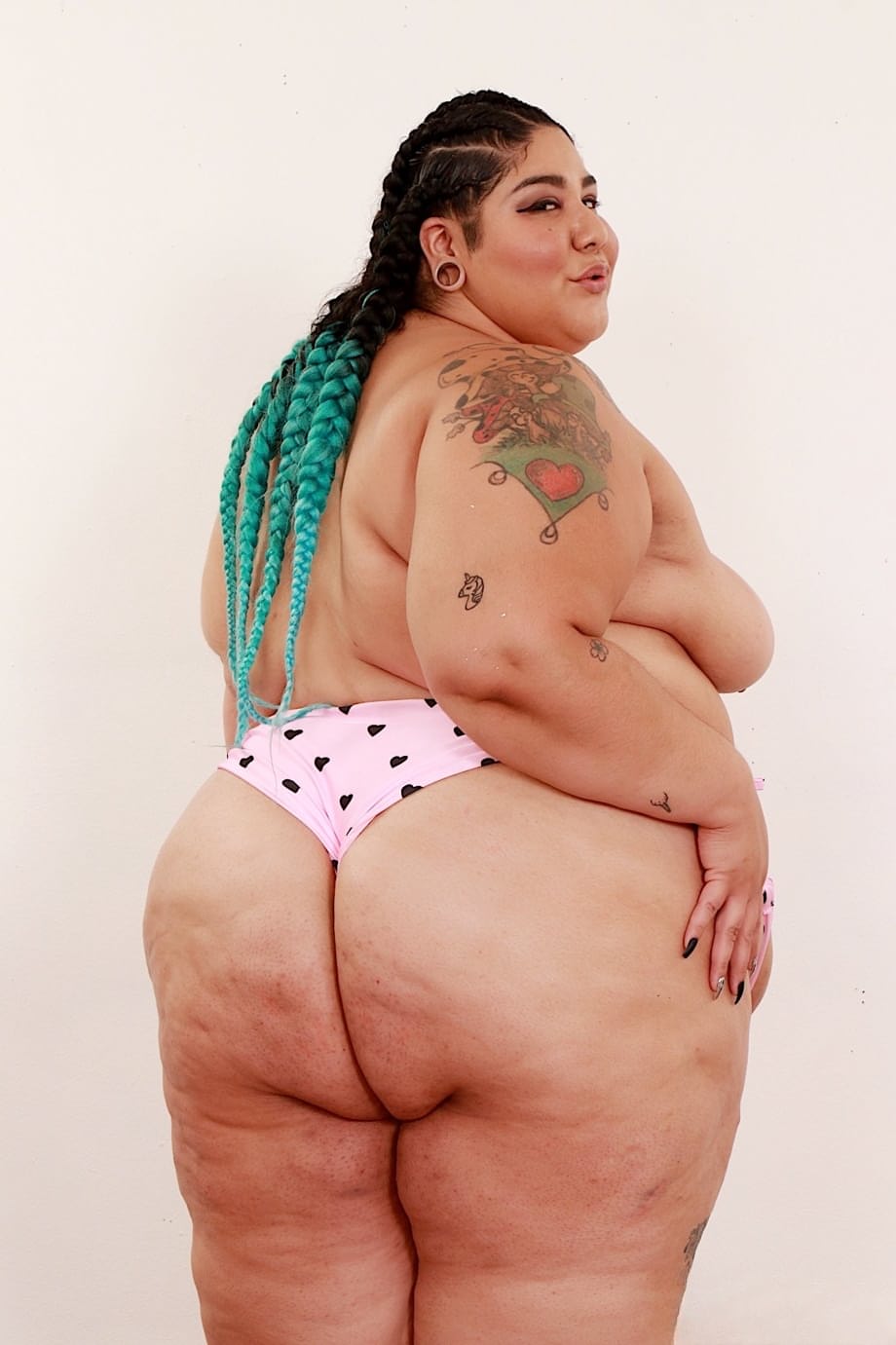 SSBBW Crystal Blue removes a bra and panty set to pose naked in shoes