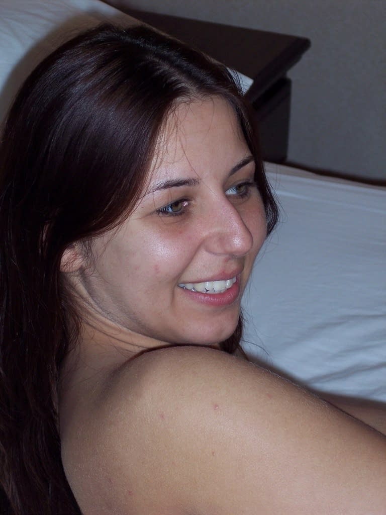 Amateur chick Lexxxi flaunts her juicy ass on a bed in heels during her debut