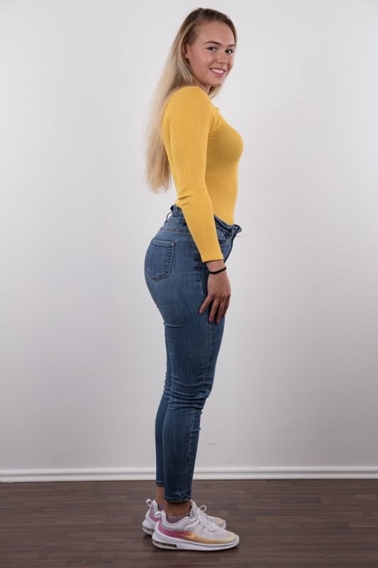 Fully clothed 18 year old Silvie stands butt naked after removing her clothes