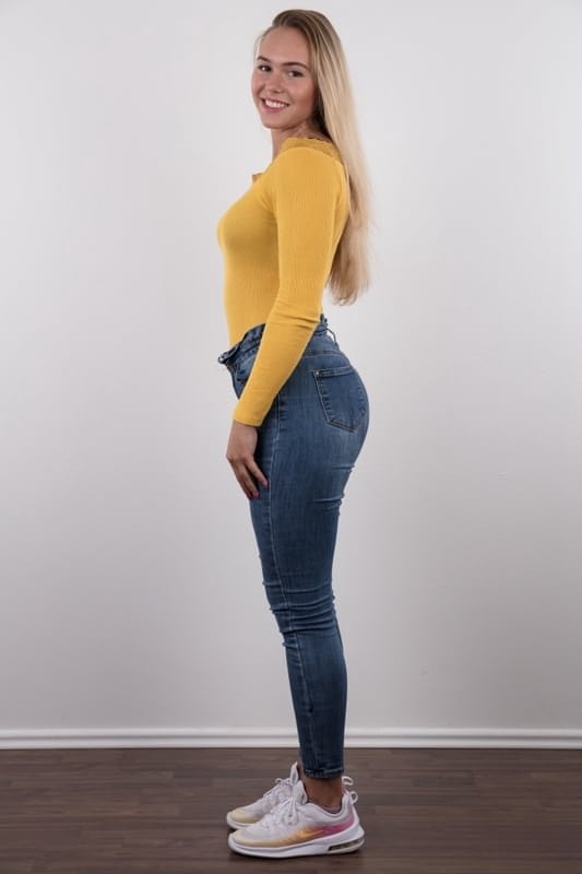Fully clothed 18 year old Silvie stands butt naked after removing her clothes