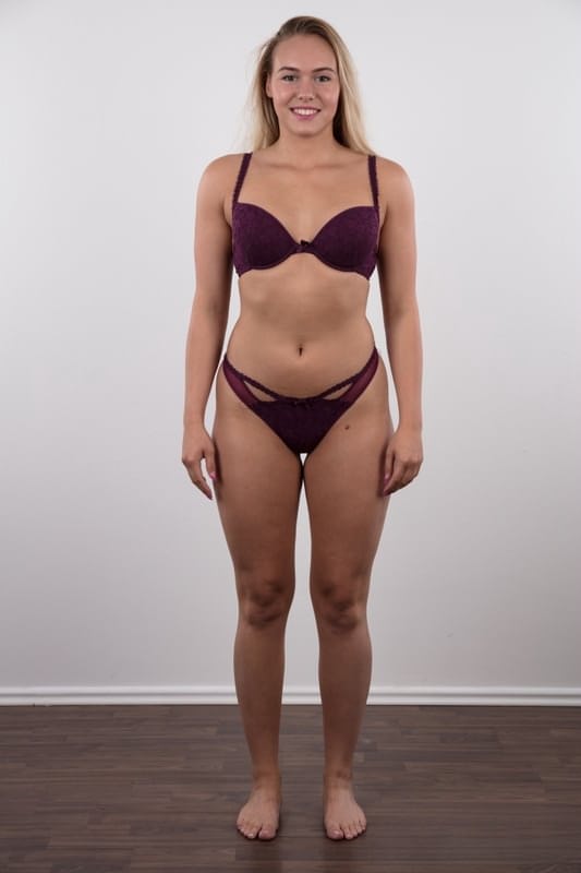 Fully clothed 18 year old Silvie stands butt naked after removing her clothes