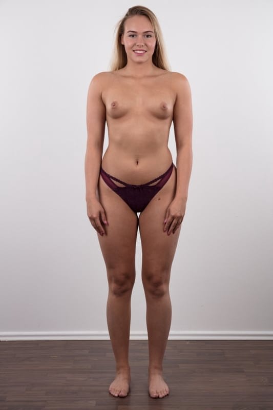 Fully clothed 18 year old Silvie stands butt naked after removing her clothes