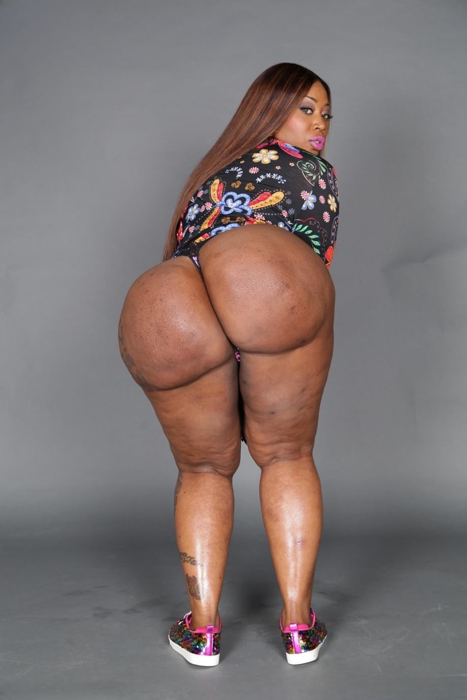 Fat black woman with a huge ass spits out jizz after gloryhole action