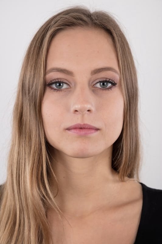 Tall teen Eliska stands totally naked while making her nude modeling debut