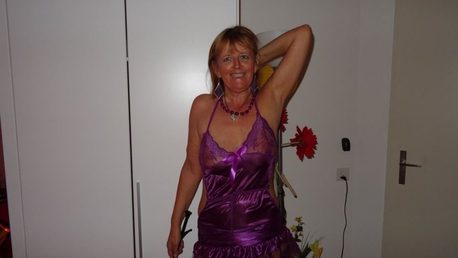 Sexy nan Abby Roberts sheds satin lingerie and stiletto heels to gets naked