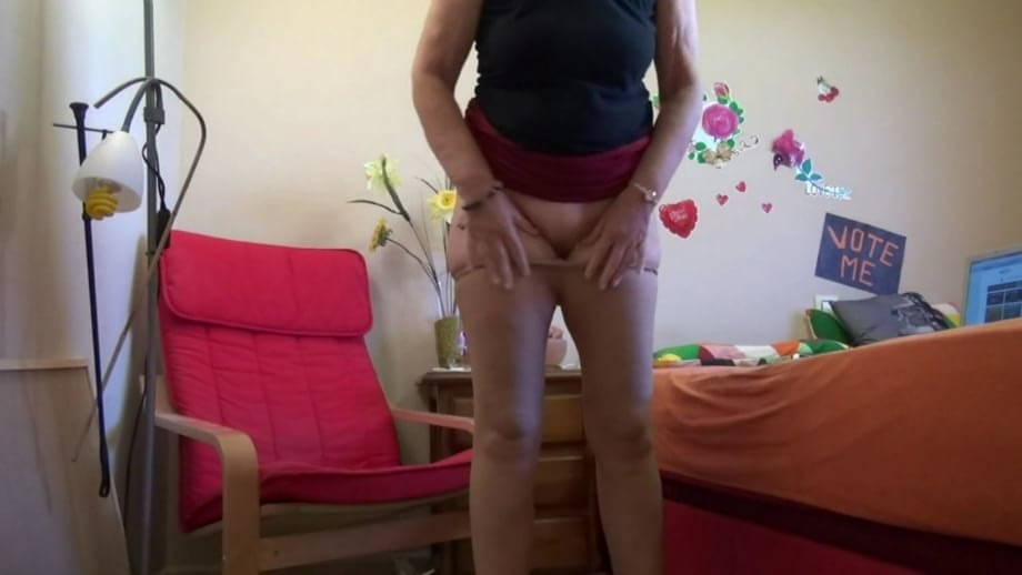 Sexy nan Abby Roberts sheds satin lingerie and stiletto heels to gets naked