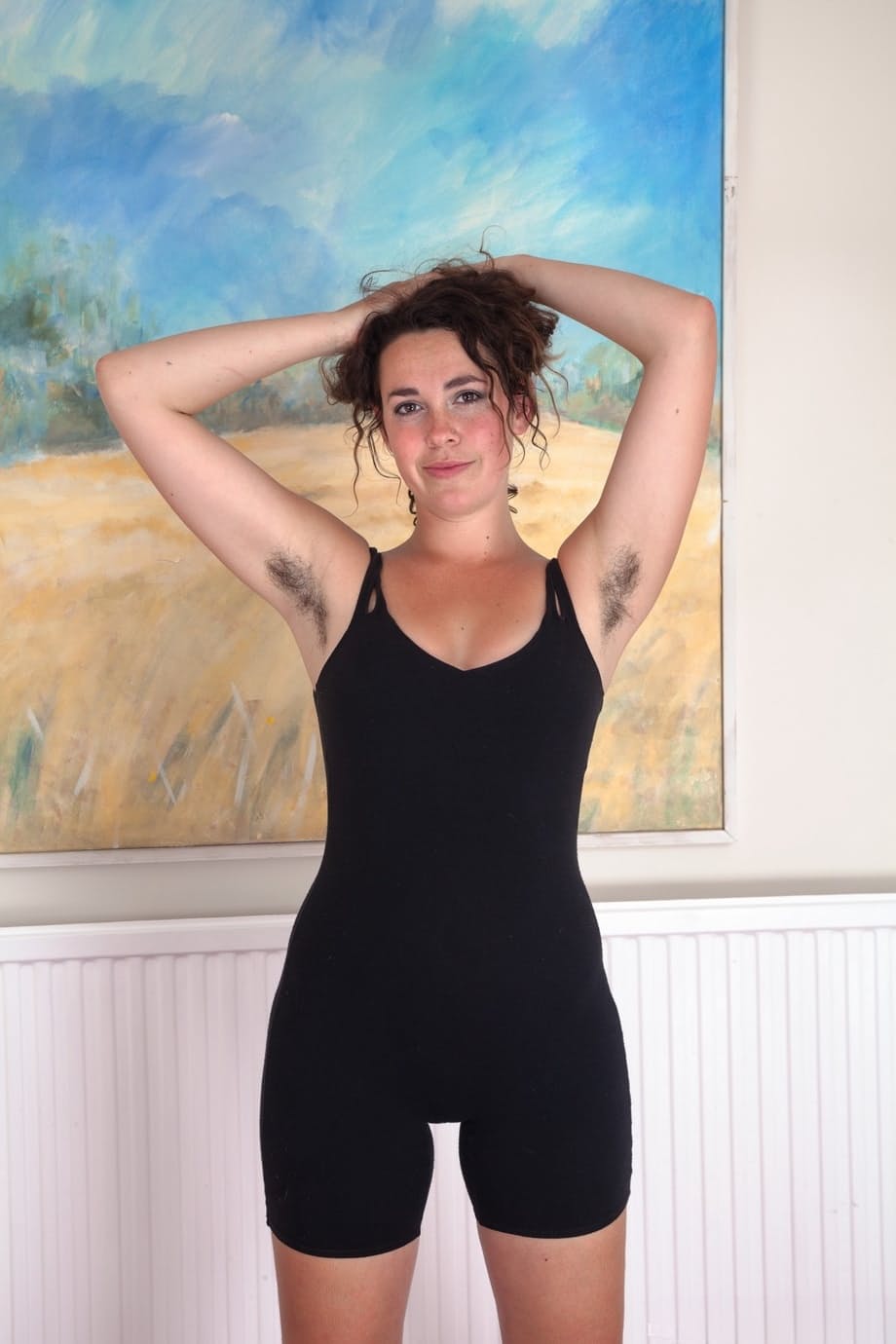Amateur chick Lola Wilde shows her hairy pits before showcasing her full bush