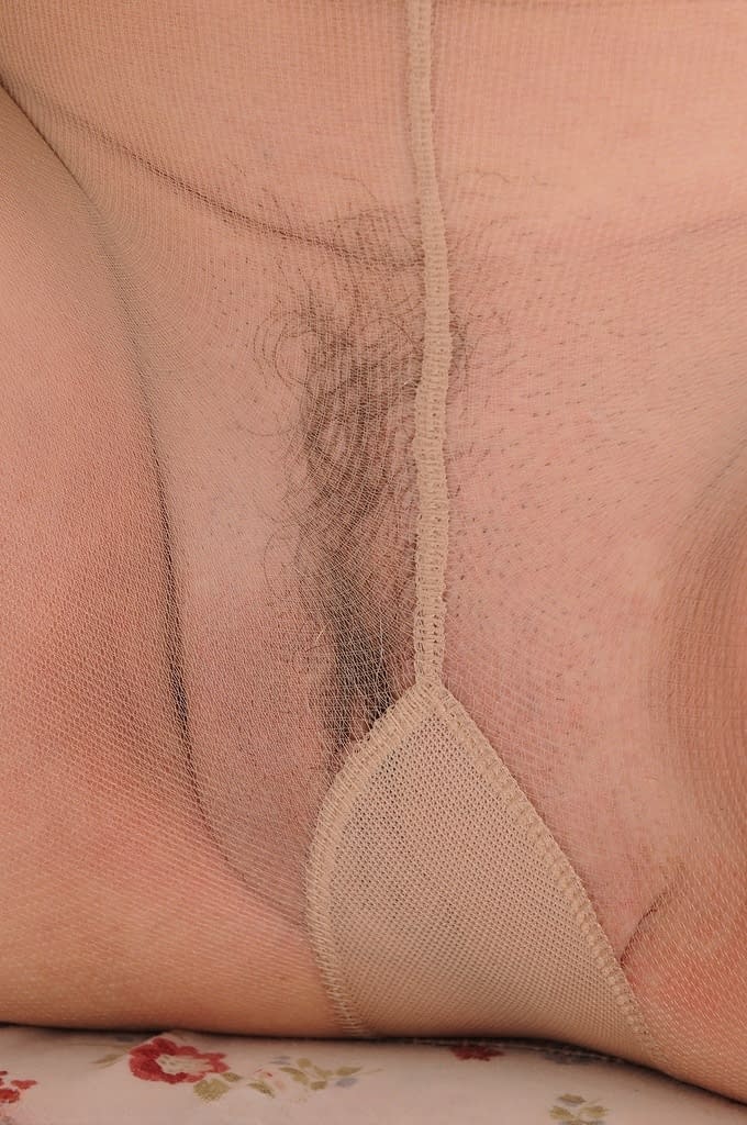 Smiley mature Jenna Covelli displays long hard nipples & pussy in pantyhose