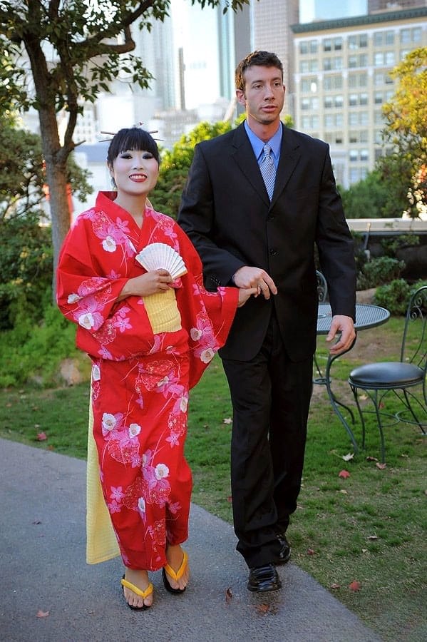 Japanese Geisha pleasures a white man she just met in a public park