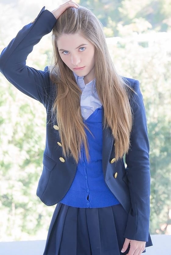 Naughty schoolgirl in uniform makes the grade on her knees
