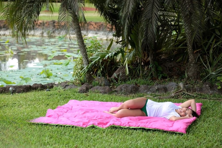 Busty Latina wets herself down in the fountain wearing a white t-shirt