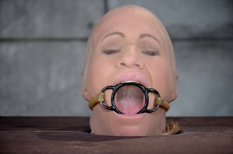 Blonde female Simone Sonay is rendered helpless in a basement dungeon