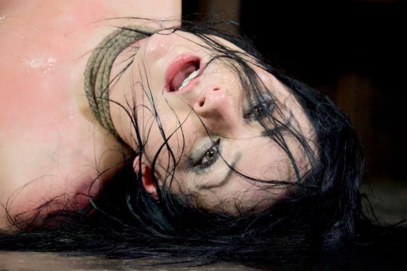 Dark haired girl with firm tits Veruca James gets face fucked while in bondage