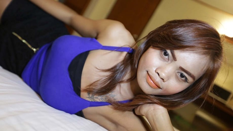 Hot Thai girl in shorts displays panty cameltoe before showing her hairy pussy