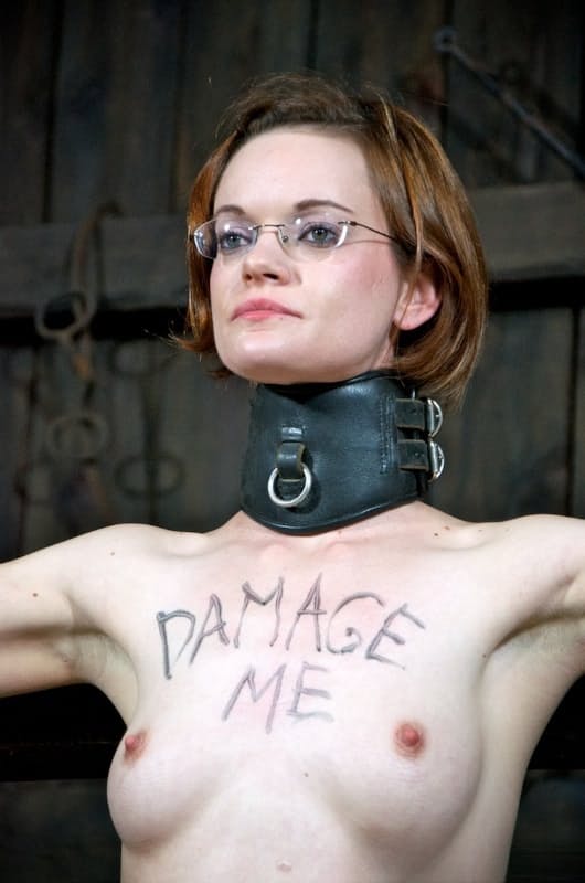Pain slut Hazel Hypnotic is subjected to plenty of abuse in a barn