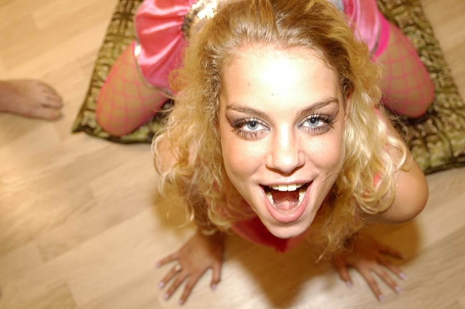 Blonde slut Angelz Silky swallows cum while sucking cocks during a gangbang