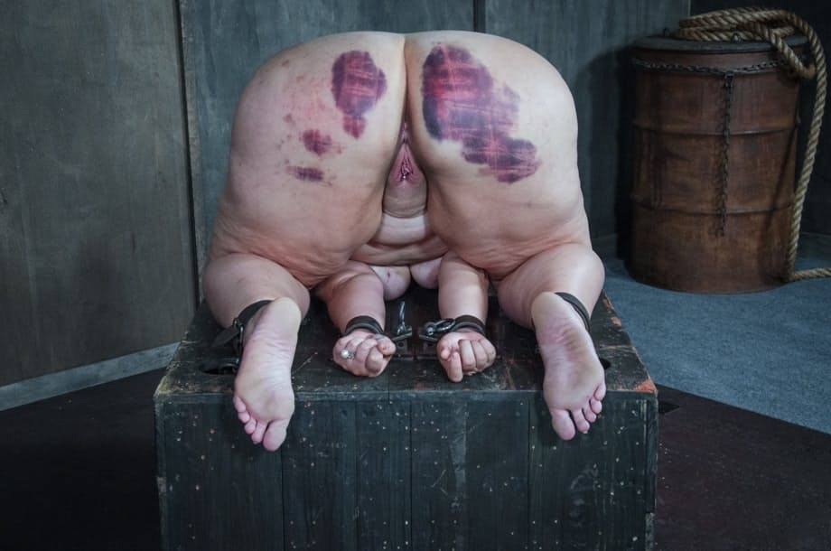 Fat chick undergoes extreme torture session and bruising in a dungeon