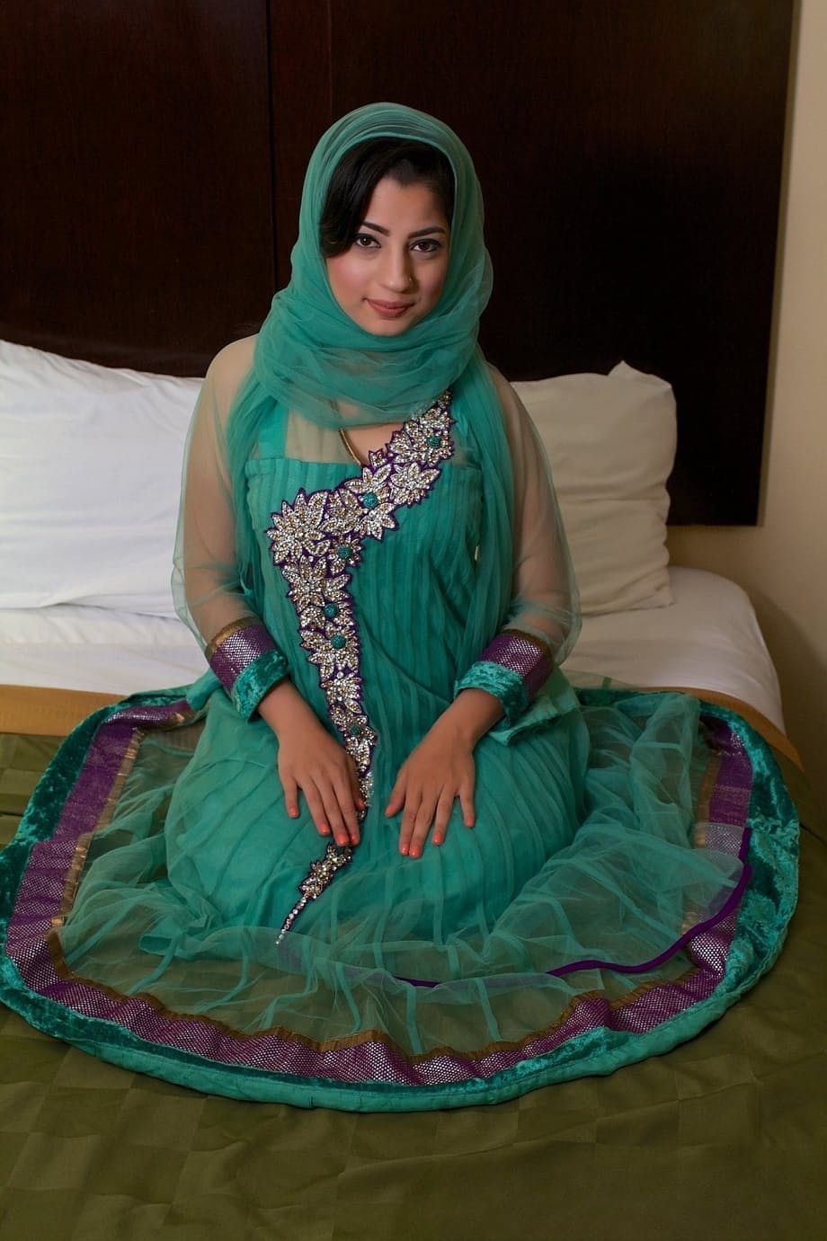 Brunette Indian pornstar Nadia Ali revealing shaved pussy for banging