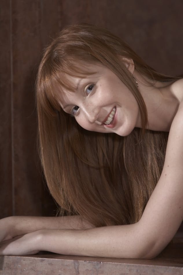 Pale redhead Baby Silver flaunts her small tits and thin body in the nude