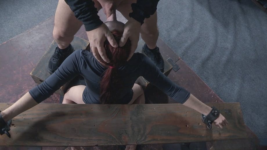 Redhead sex slave Violet Monroe is forced to deepthroat a cock