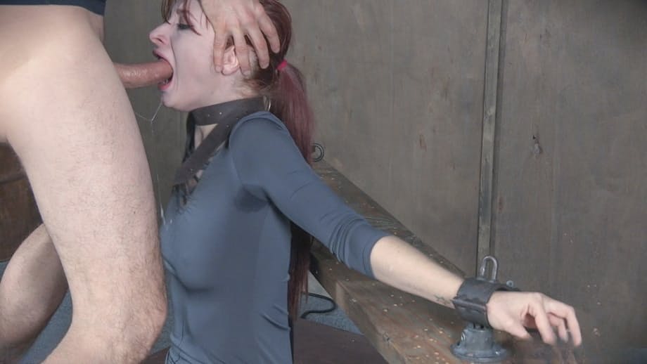 Redhead sex slave Violet Monroe is forced to deepthroat a cock
