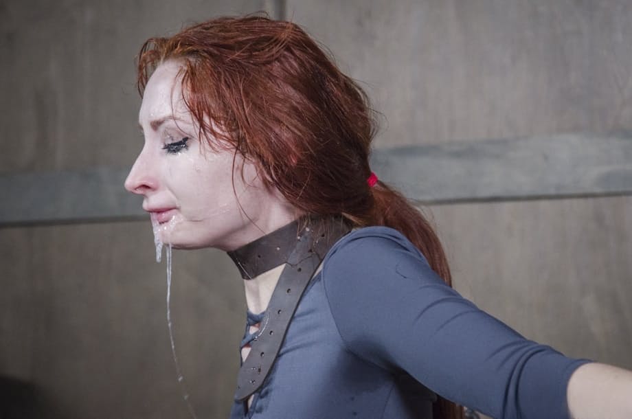 Redhead sex slave Violet Monroe is forced to deepthroat a cock