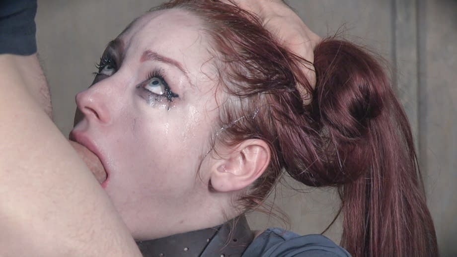 Redhead sex slave Violet Monroe is forced to deepthroat a cock