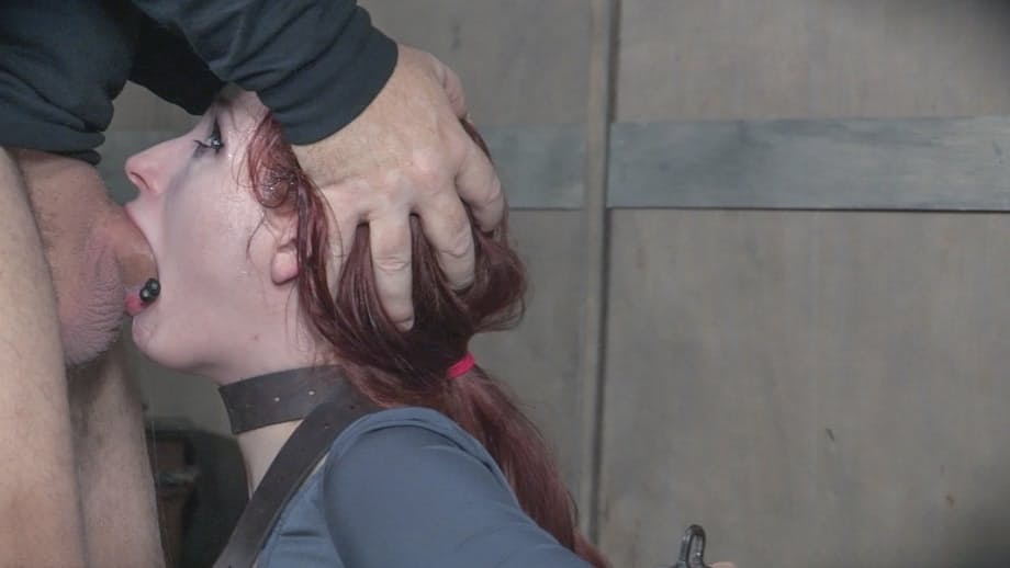 Redhead sex slave Violet Monroe is forced to deepthroat a cock