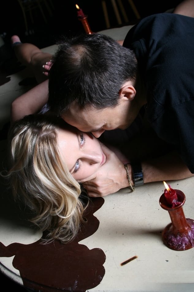 Blonde sex slave has her ass turned bright red during BDSM session