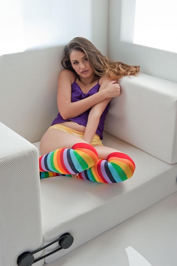 Hot Latina Allie Haze in knee socks flashes tits & plays with a vibrating toy