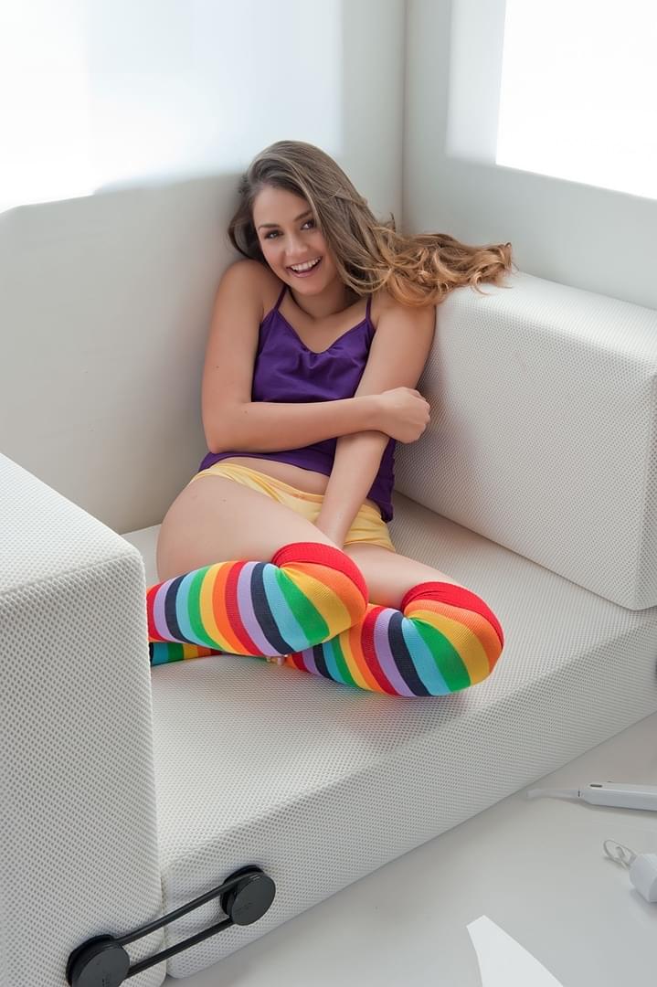 Hot Latina Allie Haze in knee socks flashes tits & plays with a vibrating toy
