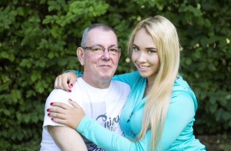 Young blonde girl with big boobs has sex with her sugar daddy in driveway