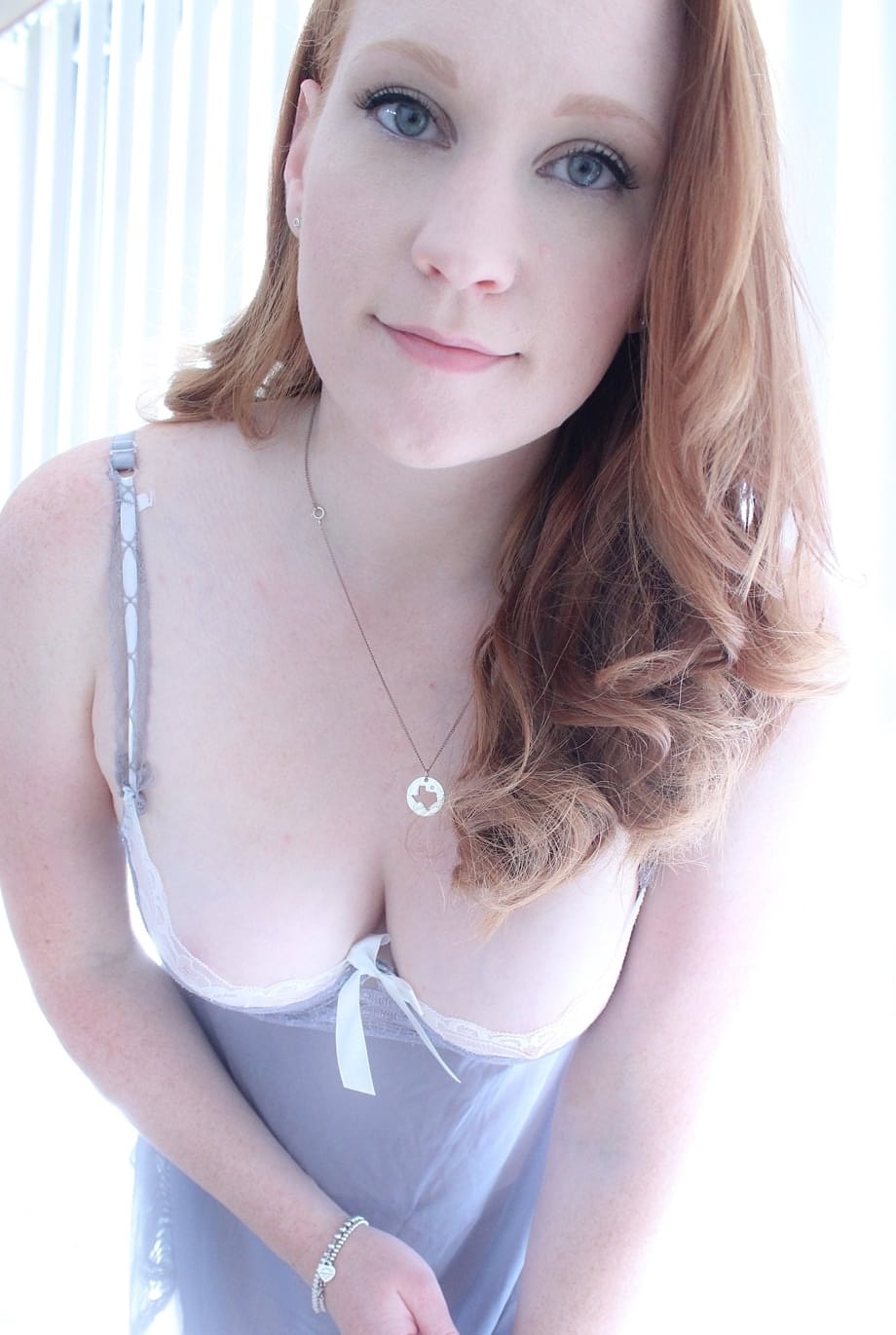 Redhead Lucy OHara hits the spot with her dildo for an arousing orgasm