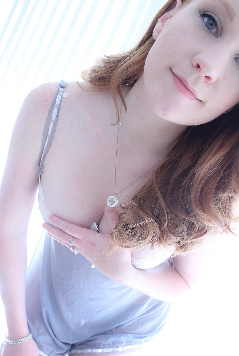 Redhead Lucy OHara hits the spot with her dildo for an arousing orgasm