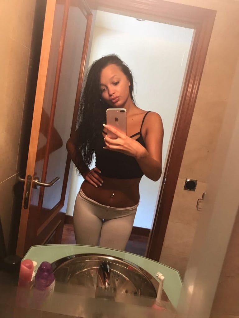 Slutty brunette Daphne Klyde takes self shot of her naked hot ass & micro tits