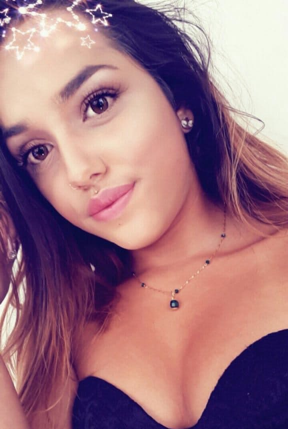 Sweet young brunette slut Esperanza poses topless for hard nipples selfie