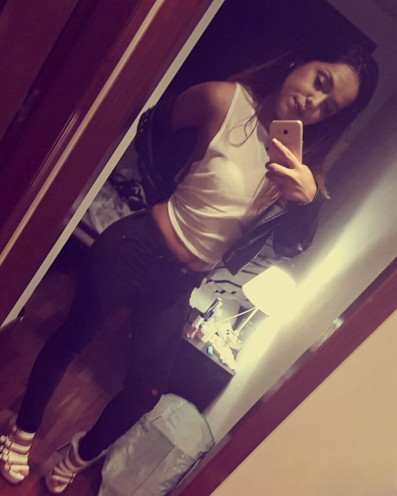 Sweet young brunette slut Esperanza poses topless for hard nipples selfie