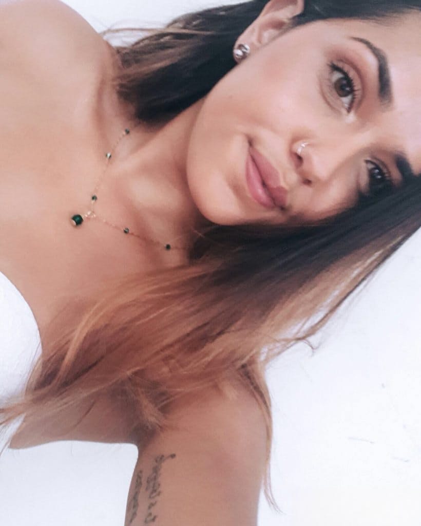 Sweet young brunette slut Esperanza poses topless for hard nipples selfie