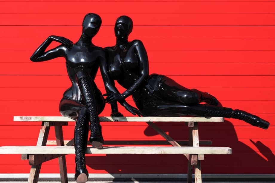 Collection of women modelling the latest in latex fashions