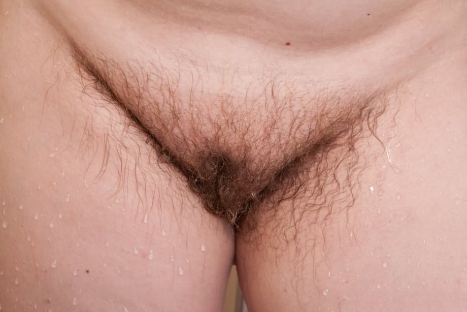 Mature fatty Romana Sweet shows off unshaven armpits and beaver in bathroom